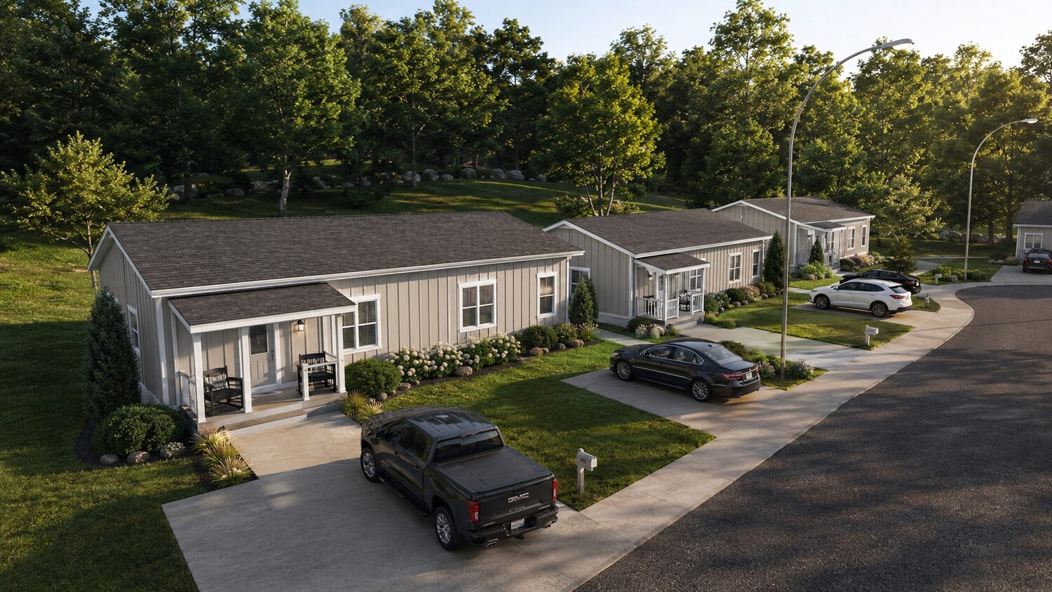 Front Porch modular duplex — streetscape showing full-width covered front porches